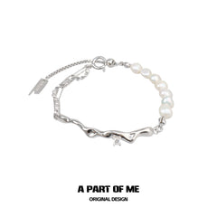 สร้อยข้อมือไข่มุกบาร็อคธรรมชาติแท้ 925 ดีไซน์หรูหราตลอดกาล™