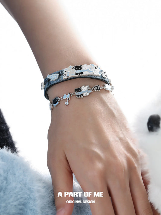 Hello Winter Black Kitten and White Puppy Blue Leather Bracelet™