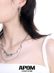 ต่างหูแบบติดพู่ไม่สมมาตรเคลือบแพลตตินัม 18K S925 จาก Ice Field™