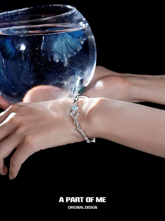 Aqua Fragments 18K Platinum Plated Aquamarine Dolphin Bracelet™
