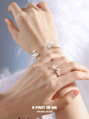 Divine Plume Platinum-Plated Angel Feather Adjustable Open Bangle™