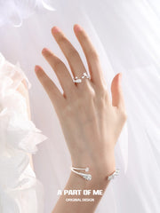 Divine Plume Platinum-Plated Angel Feather Adjustable Open Bangle™